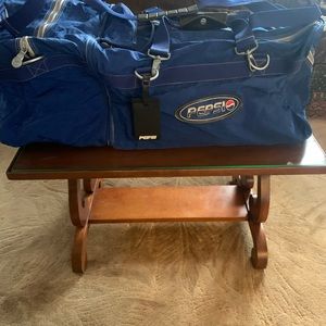 Large 3 bags in one Pepsi branded duffle.